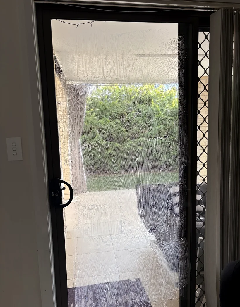 Glass door during cleaning