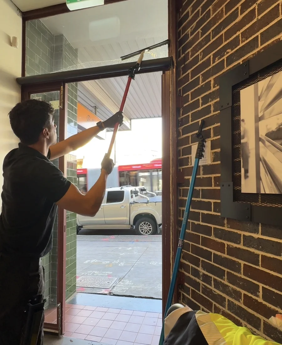 Commercial window cleaning in progress