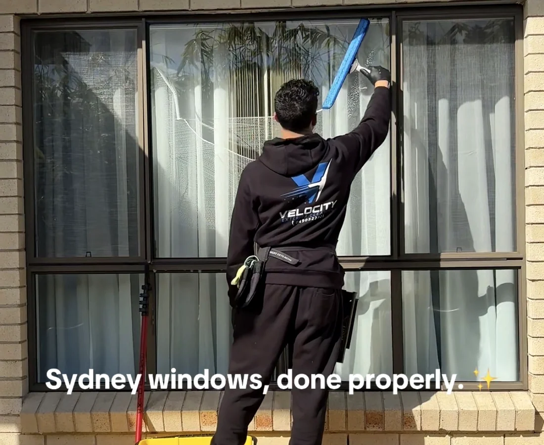 Velocity Exterior Cleaning cleaning a residential window
