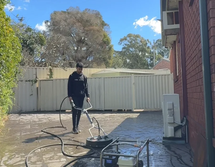 Pressure washing a driveway in Sydney